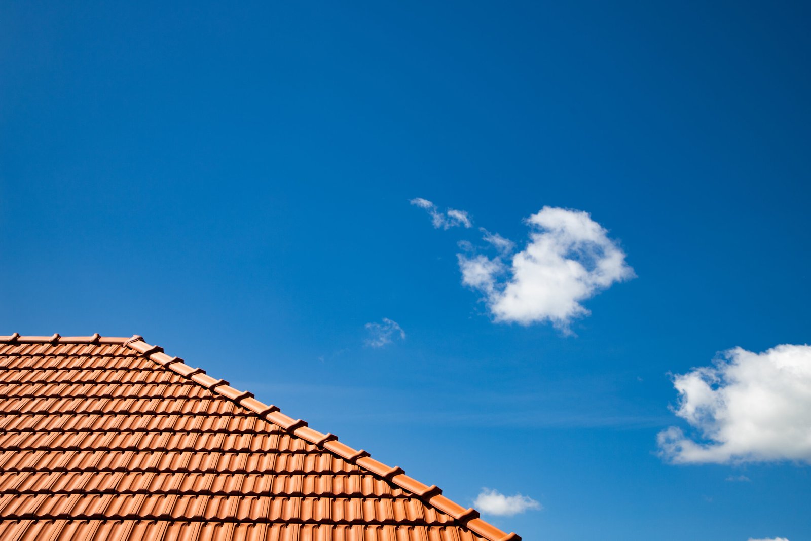 new-red-tiles-roof-and-blue-sky-2025-03-28-08-59-17-utc-scaled.jpg